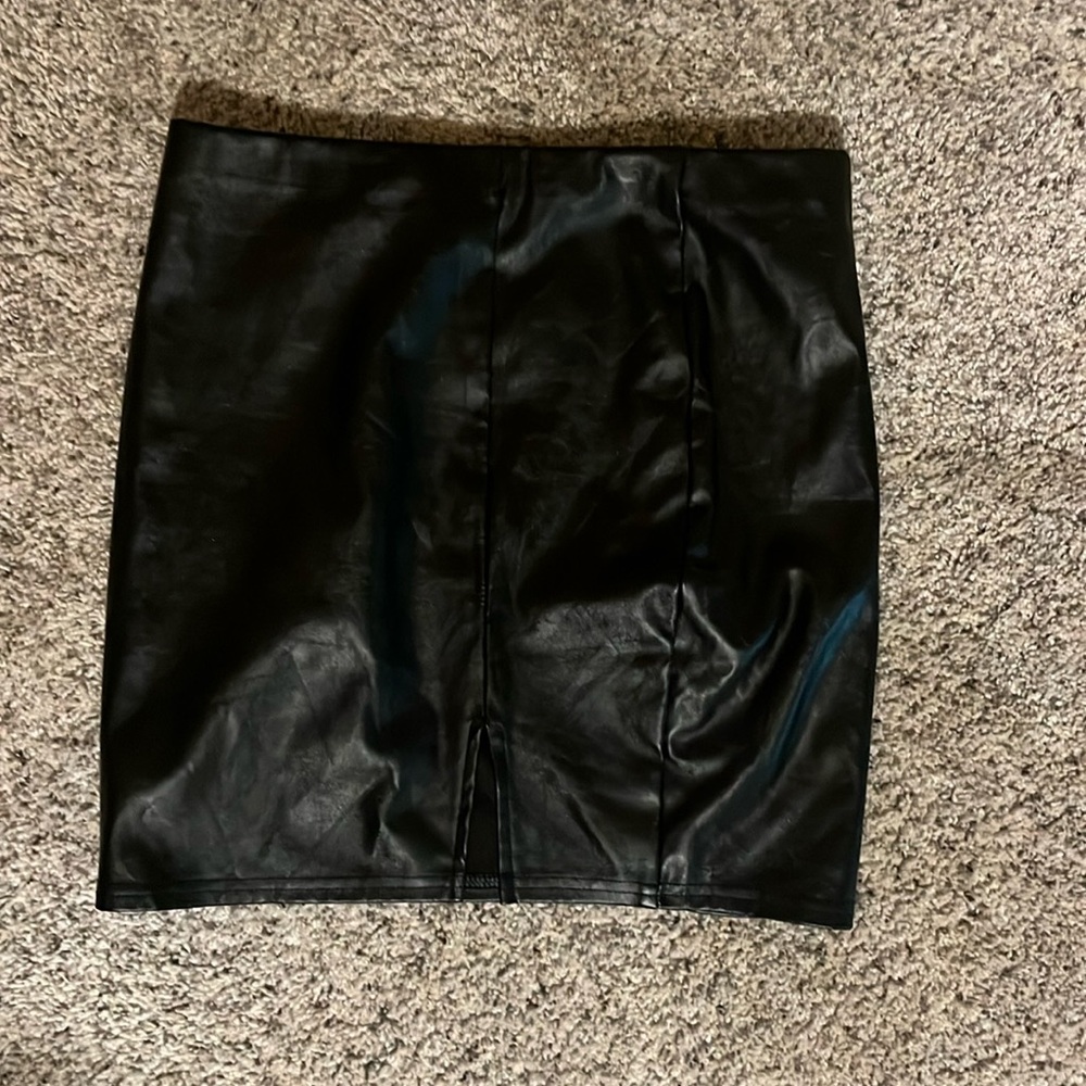 black faux leather mini skirt